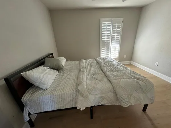 a living room with furniture and window