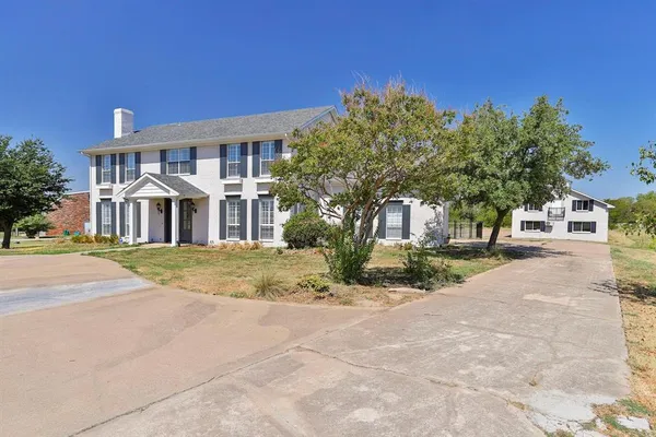 a view of a building with a street