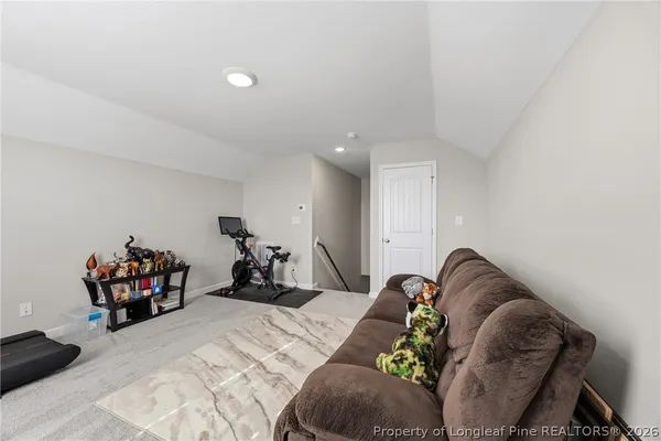 a bed room with a bed and a couch