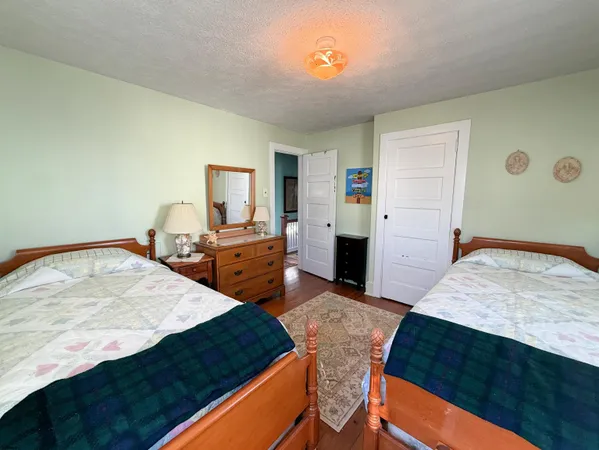 a living room with a bed