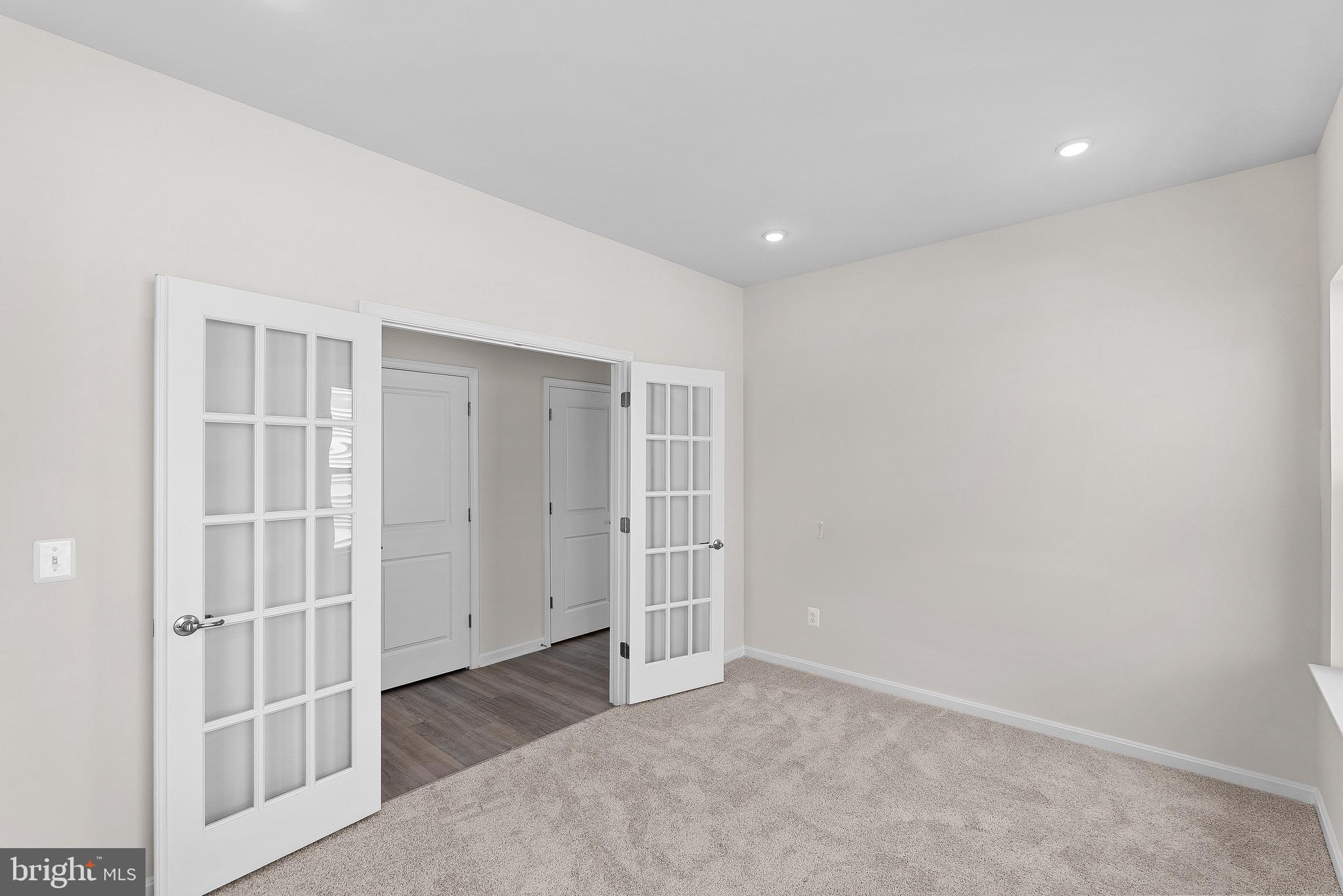 92 Outrigger Road Inwood, WV 25428 - Photo 2 of 31 an empty room with entrance and door