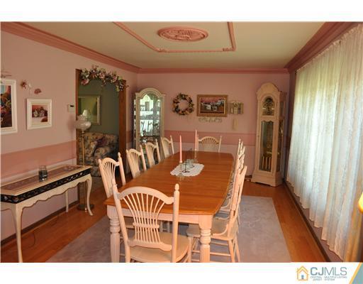 64 Ridge Road Edison, NJ 08817 - Photo 5 of 22 a dining room with furniture and window