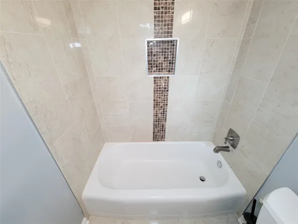 a bathroom with a bathtub