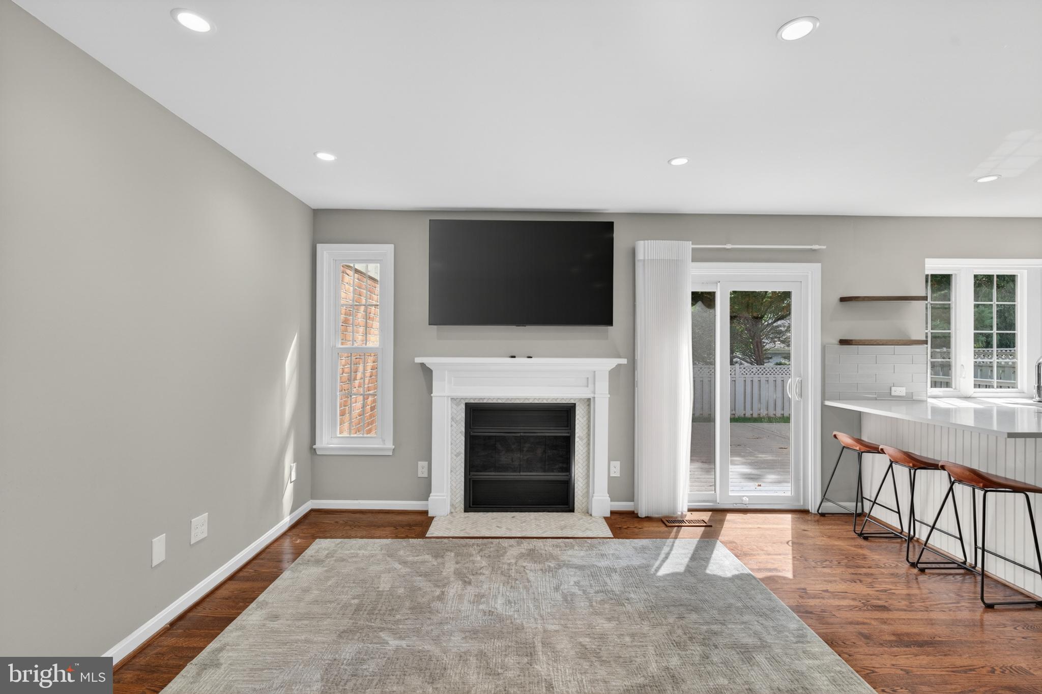 6 Nearfield Road Lutherville-Timonium, MD 21093 - Photo 28 of 71 a view of an empty room with a fireplace and a window