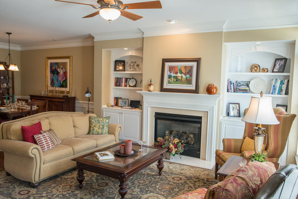 1445 Clancy Road Mount Pleasant, SC 29466 - Photo 3 of 37 Living room with fireplace and built ins