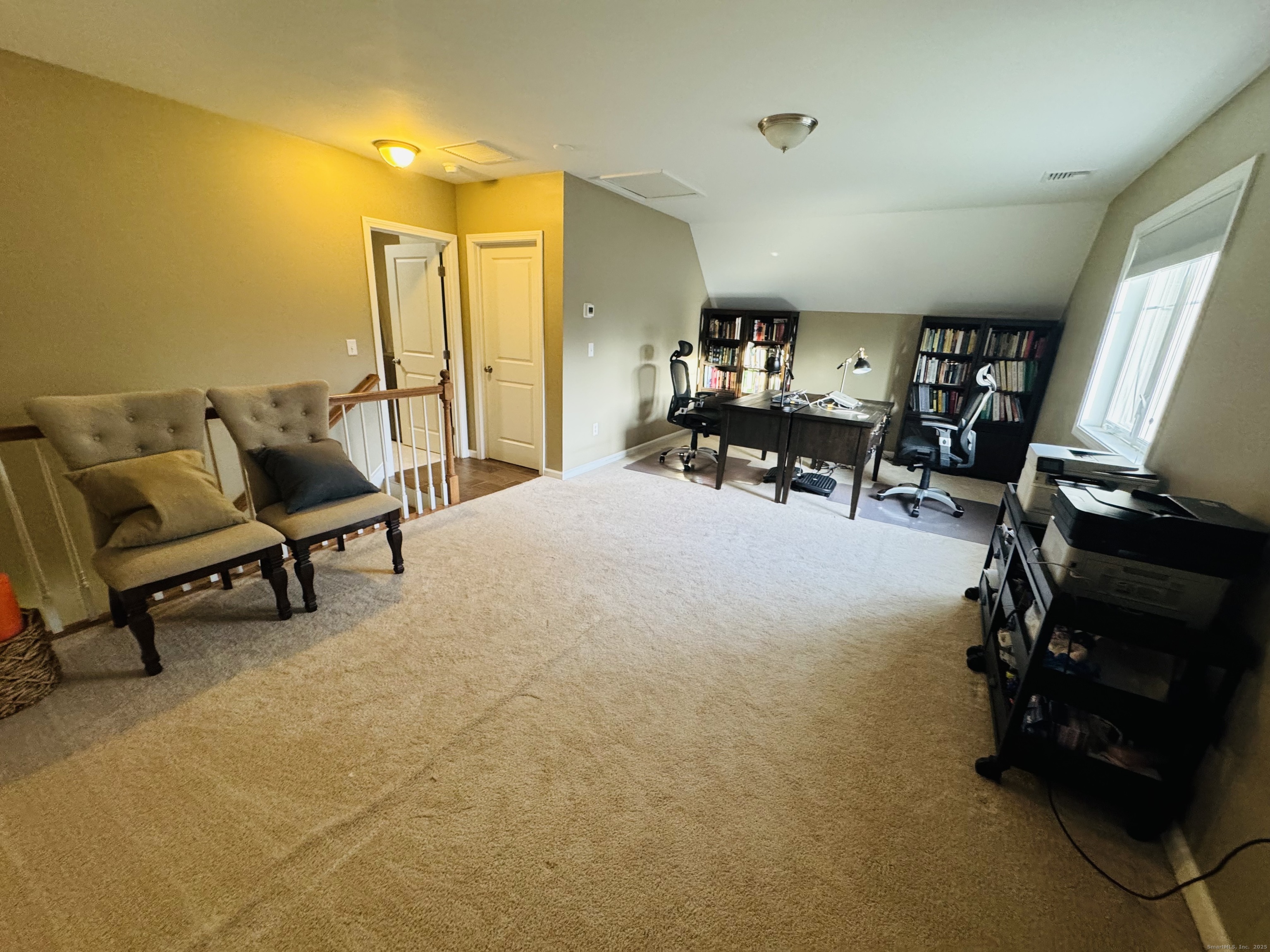 123 Ashford Road, Unit 1 Eastford, CT 06242 - Photo 11 of 24 a bedroom with furniture and a flat screen tv