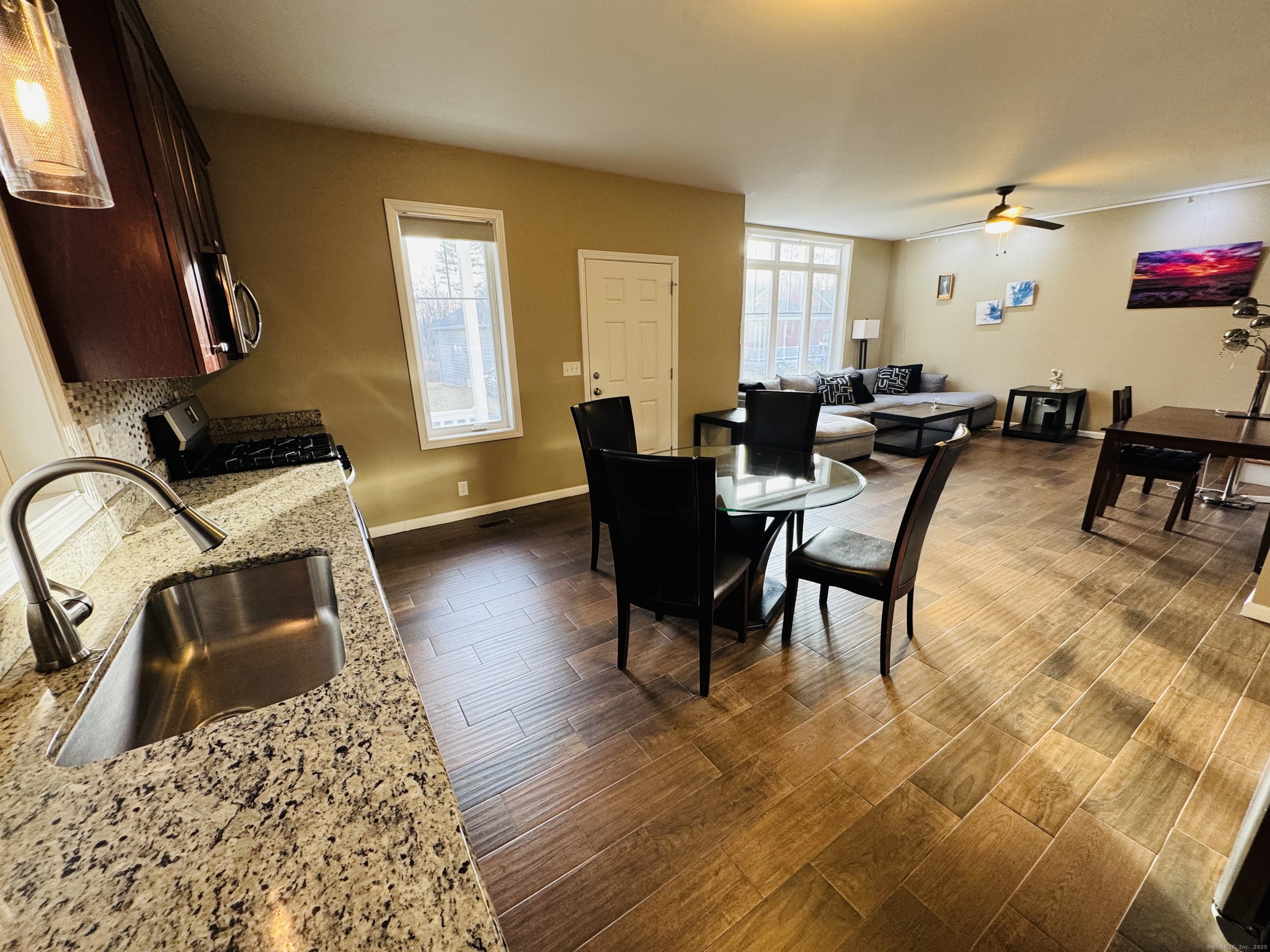 123 Ashford Road, Unit 1 Eastford, CT 06242 - Photo 3 of 24 a living room with furniture and a wooden floor