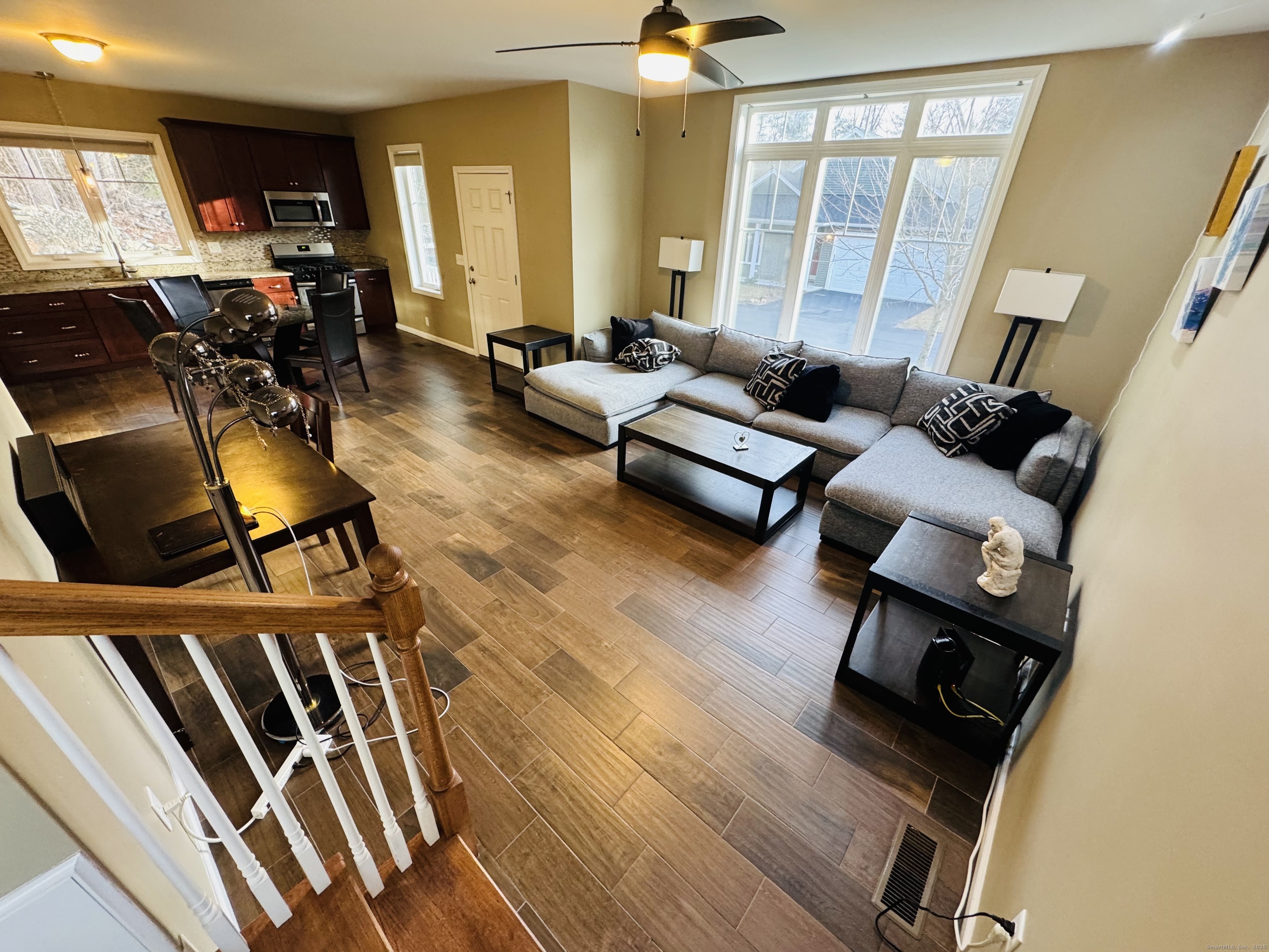 123 Ashford Road, Unit 1 Eastford, CT 06242 - Photo 6 of 24 a living room with furniture and wooden floor