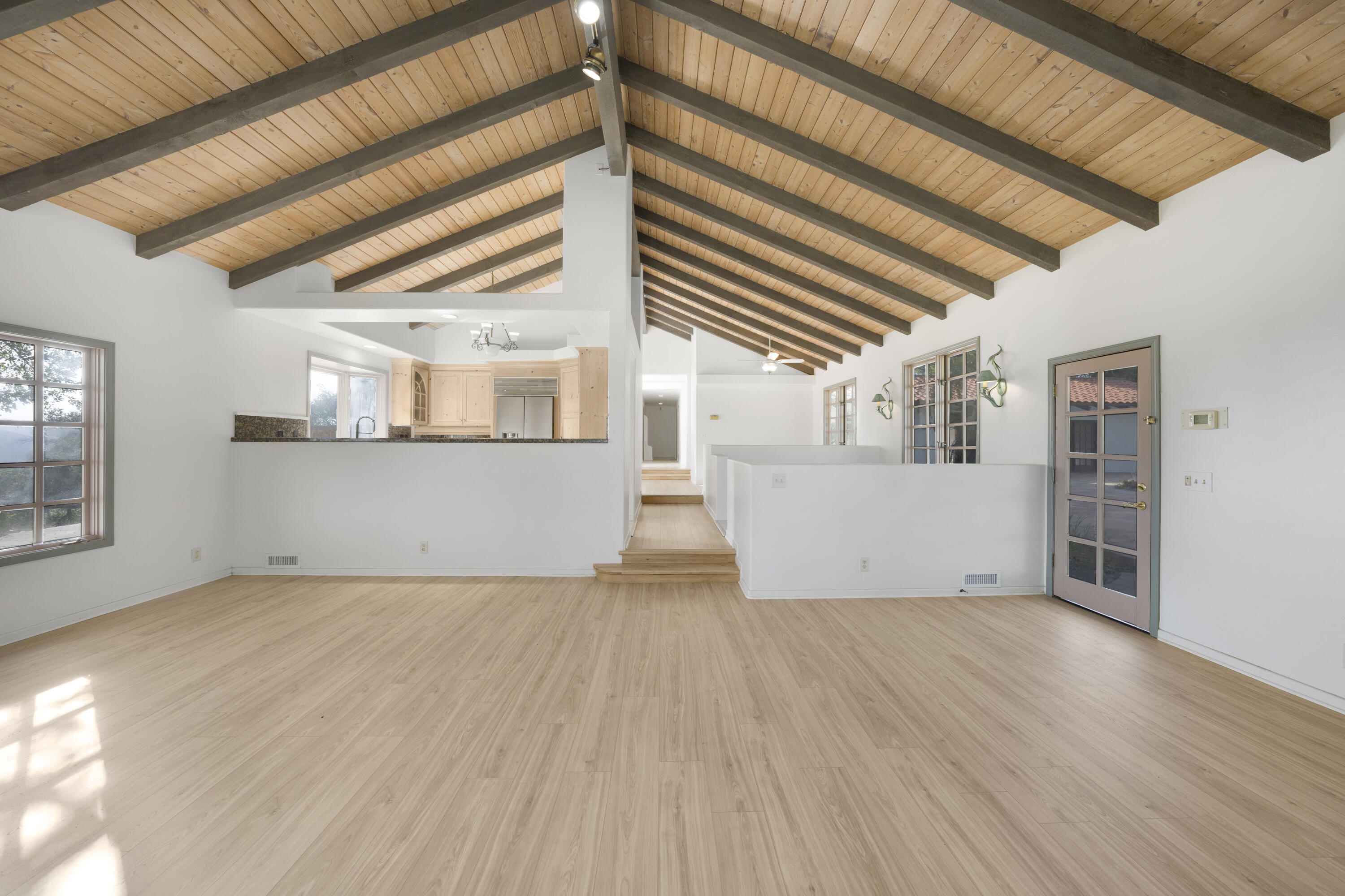 1225 Poppy Valley Road Buellton, CA 93427 - Photo 13 of 42 a view of a room with wooden floors and stairs