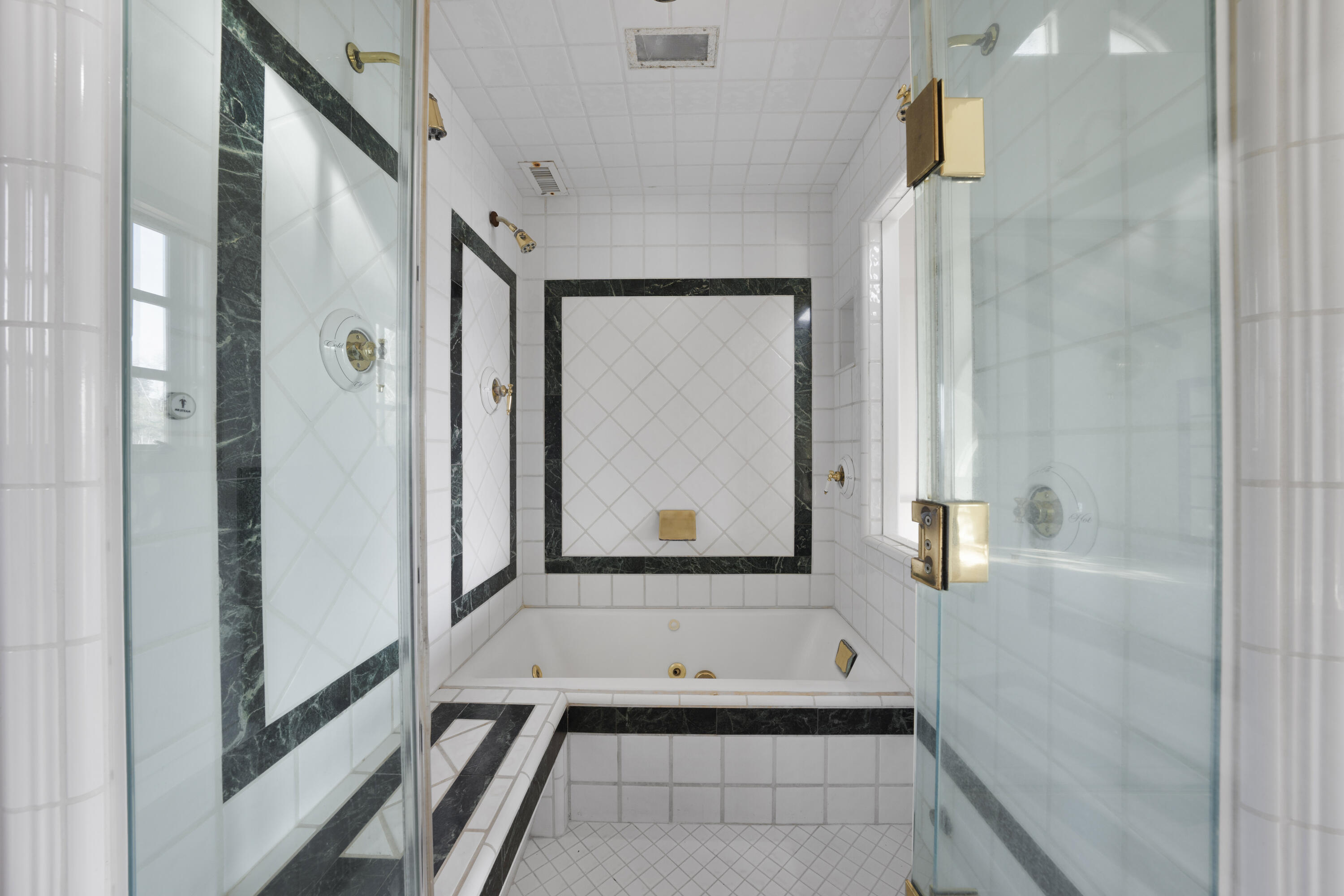 1225 Poppy Valley Road Buellton, CA 93427 - Photo 19 of 42 a bathroom with a tub shower and a sink