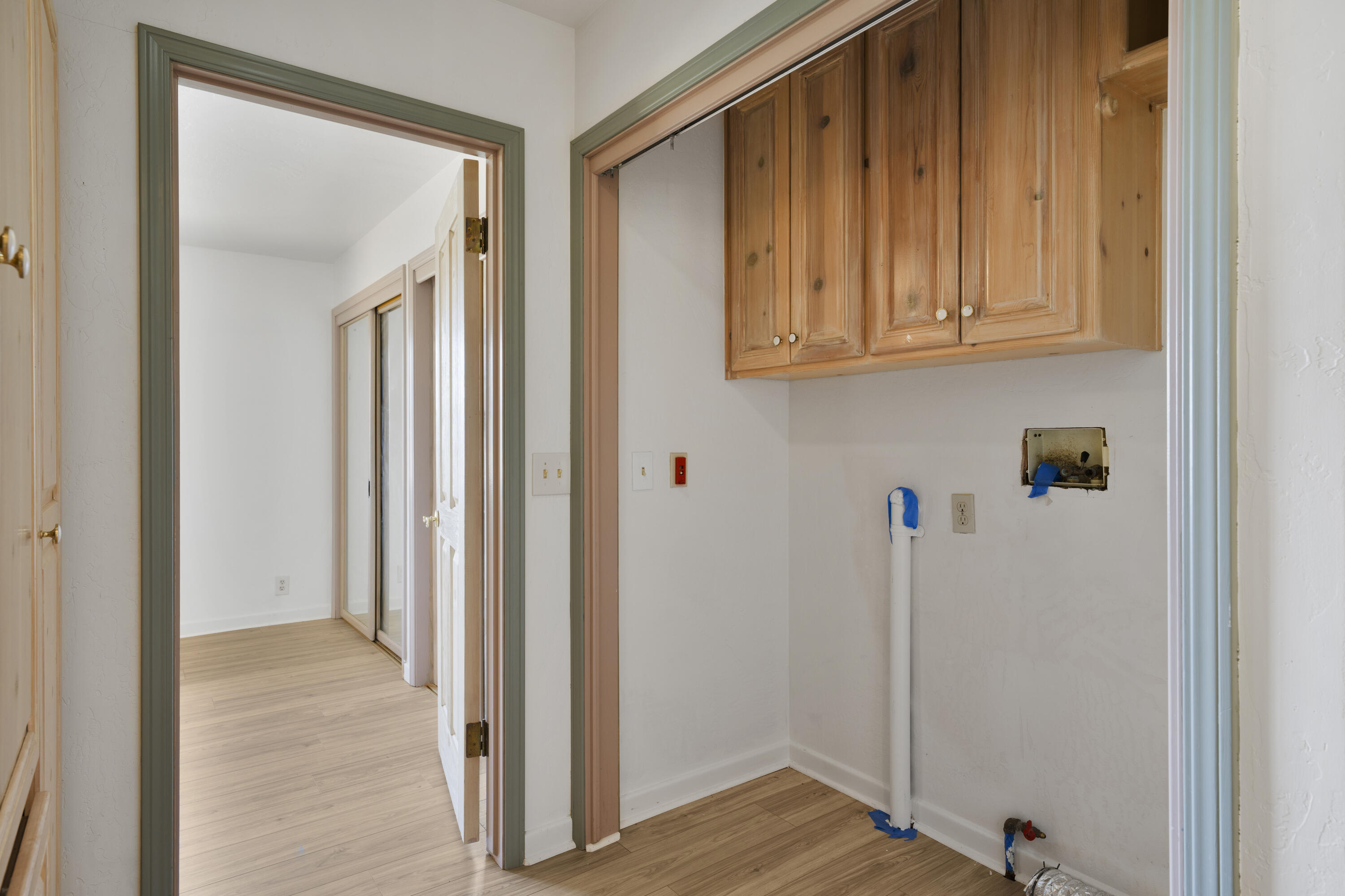 1225 Poppy Valley Road Buellton, CA 93427 - Photo 26 of 42 a view of a closet area with wooden floor