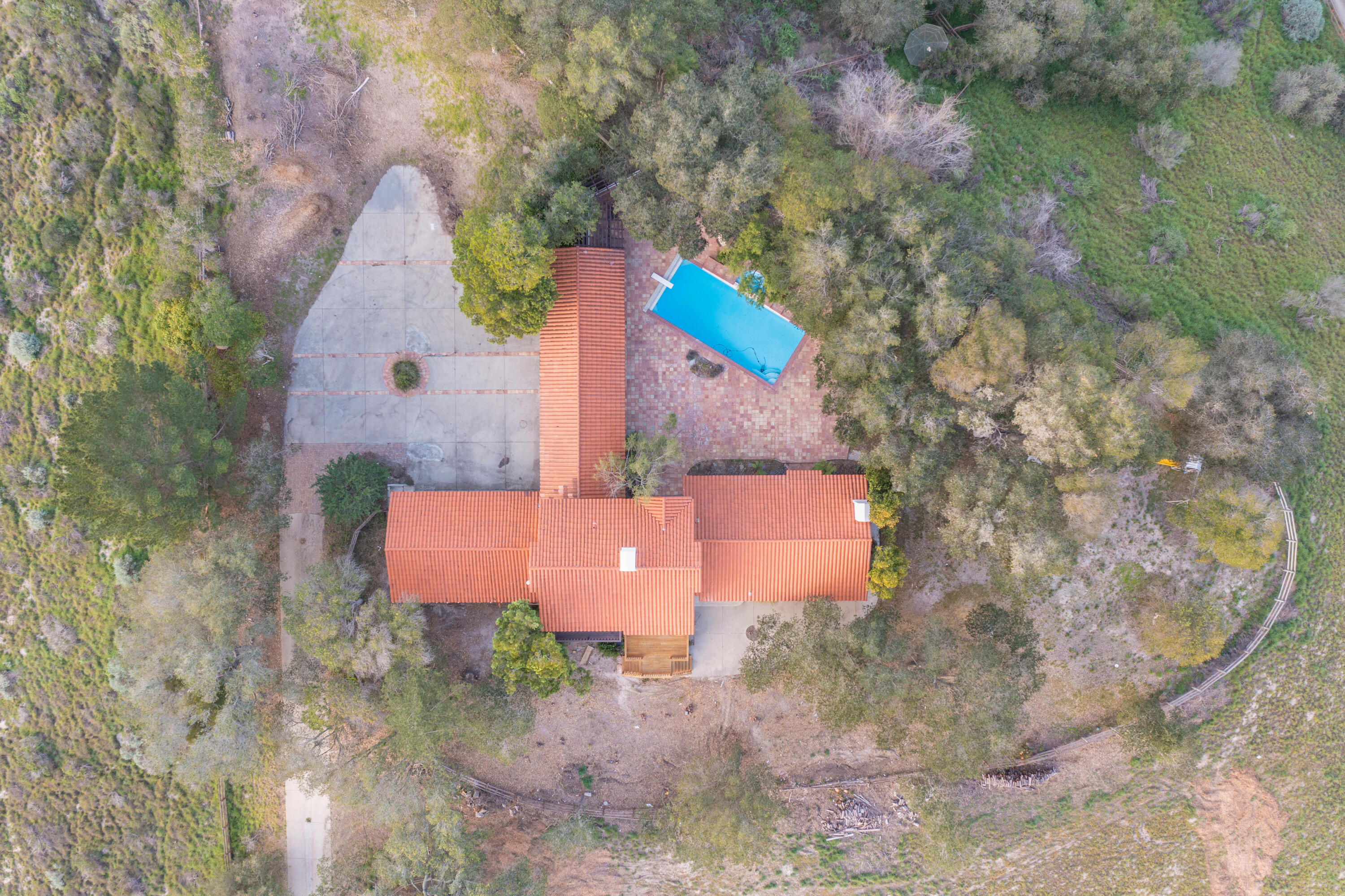 1225 Poppy Valley Road Buellton, CA 93427 - Photo 37 of 42 a aerial view of a house with outdoor space and a lake view