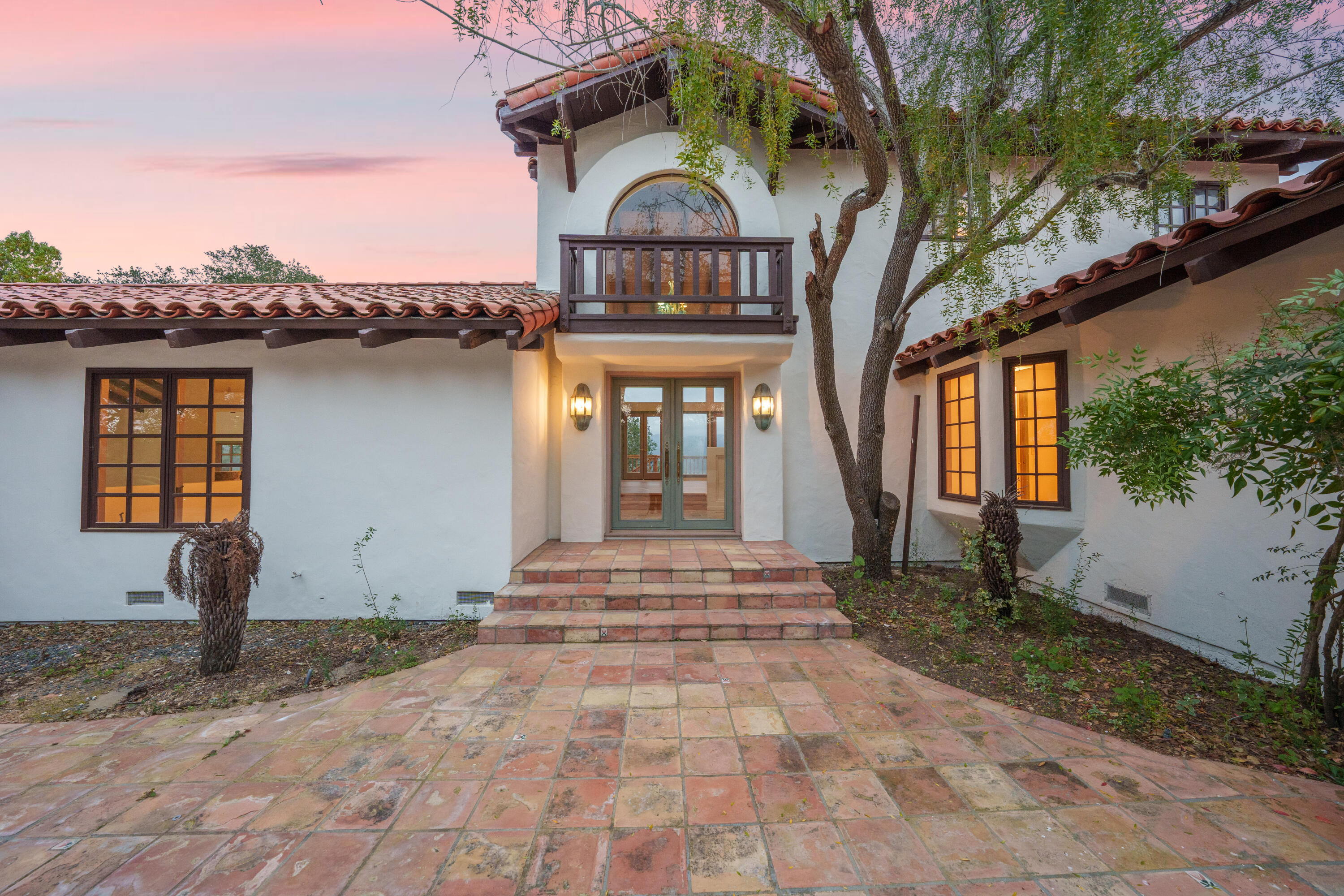 1225 Poppy Valley Road Buellton, CA 93427 - Photo 4 of 42 a front view of a house with garden