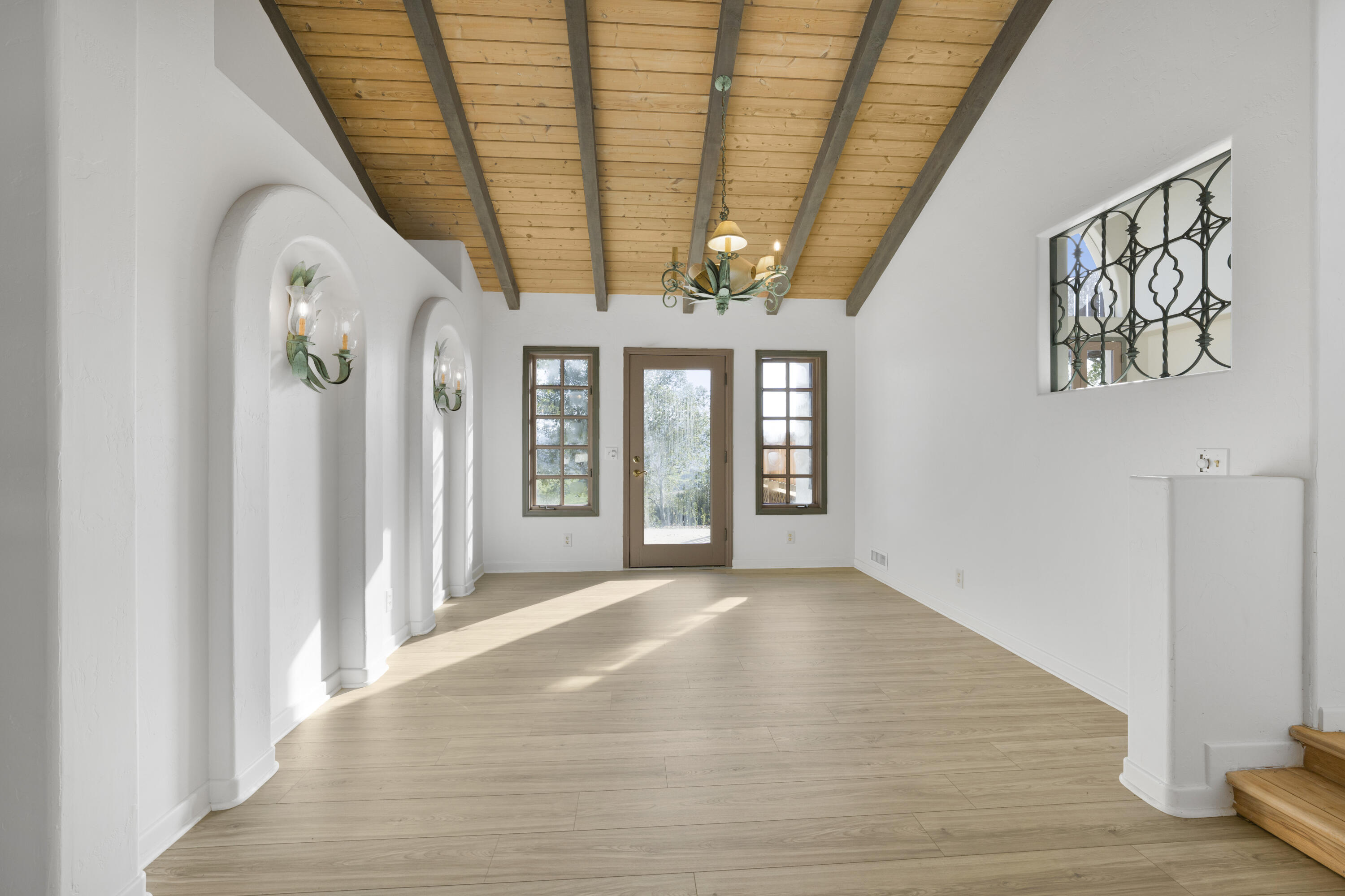 1225 Poppy Valley Road Buellton, CA 93427 - Photo 8 of 42 a view of a room with wooden floor and windows
