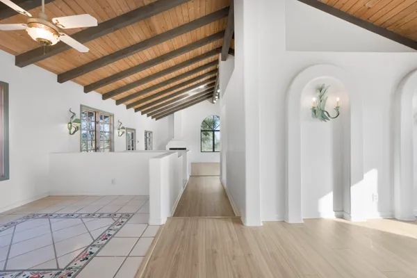 a view of a livingroom with wooden floor