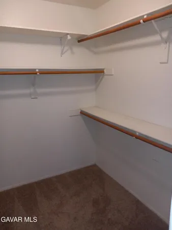 a view of small space with racks on the wall