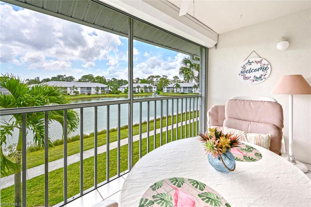 515 Gabriel Circle, Unit 1910 Naples, FL 34104 - Photo 18 of 29 a view of a balcony with furniture
