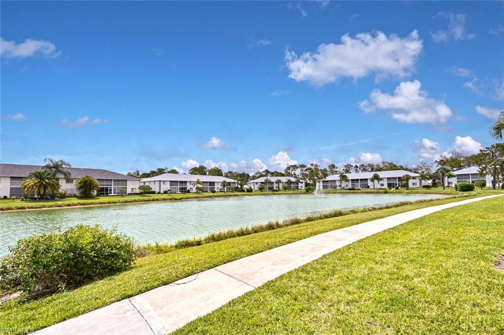 515 Gabriel Circle, Unit 1910 Naples, FL 34104 - Photo 22 of 29 a view of an ocean and city