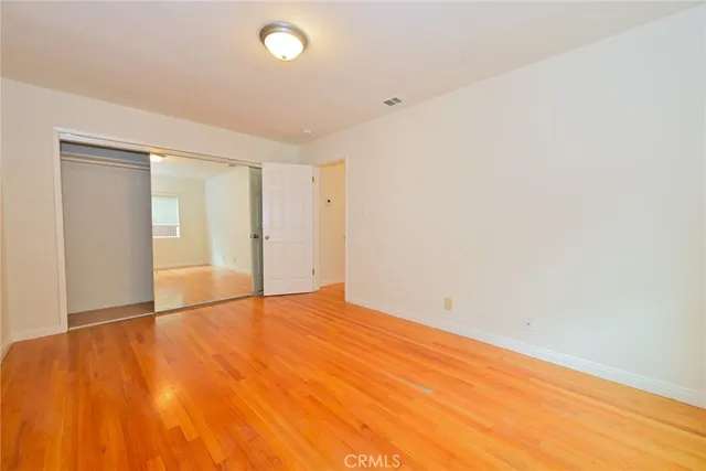a kitchen with a sink a refrigerator and a stove