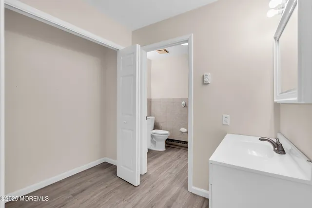 a bathroom with a sink and a toilet