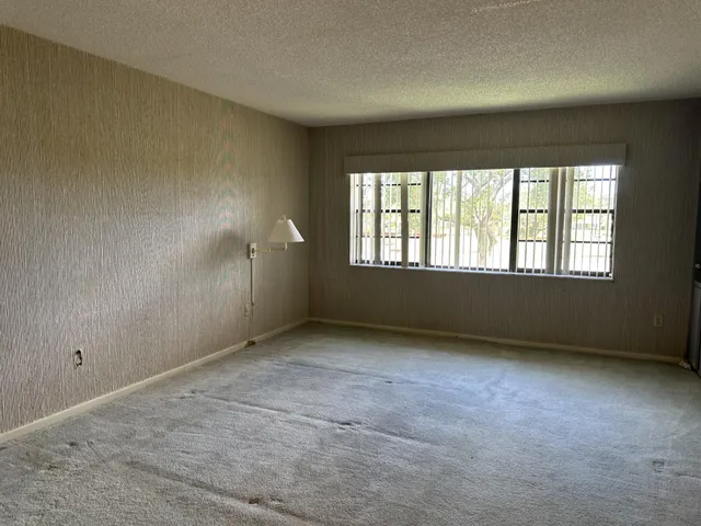 an empty room with windows
