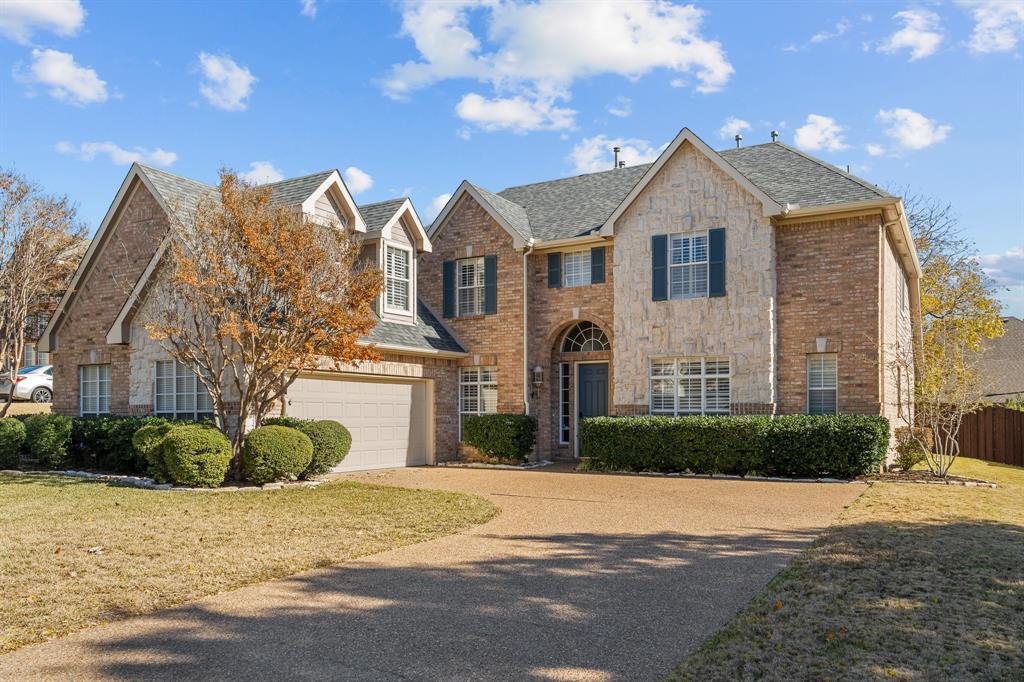 1713 Winding Hollow Lane McKinney, TX 75072 - Photo 1 of 1 a front view of a house with a yard