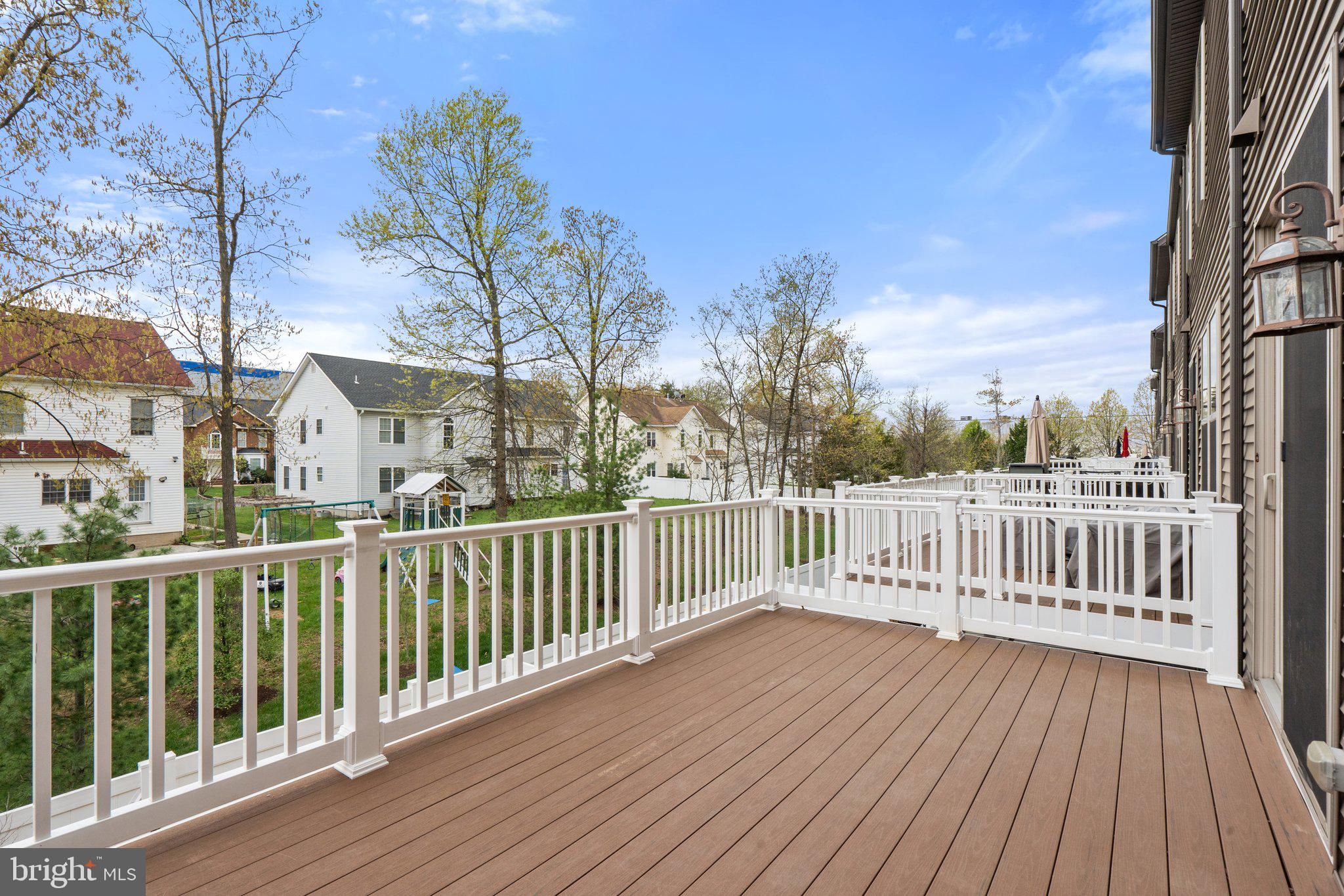 45397 Daveno Square Sterling, VA 20164 - Photo 13 of 44 a view of a wooden roof deck