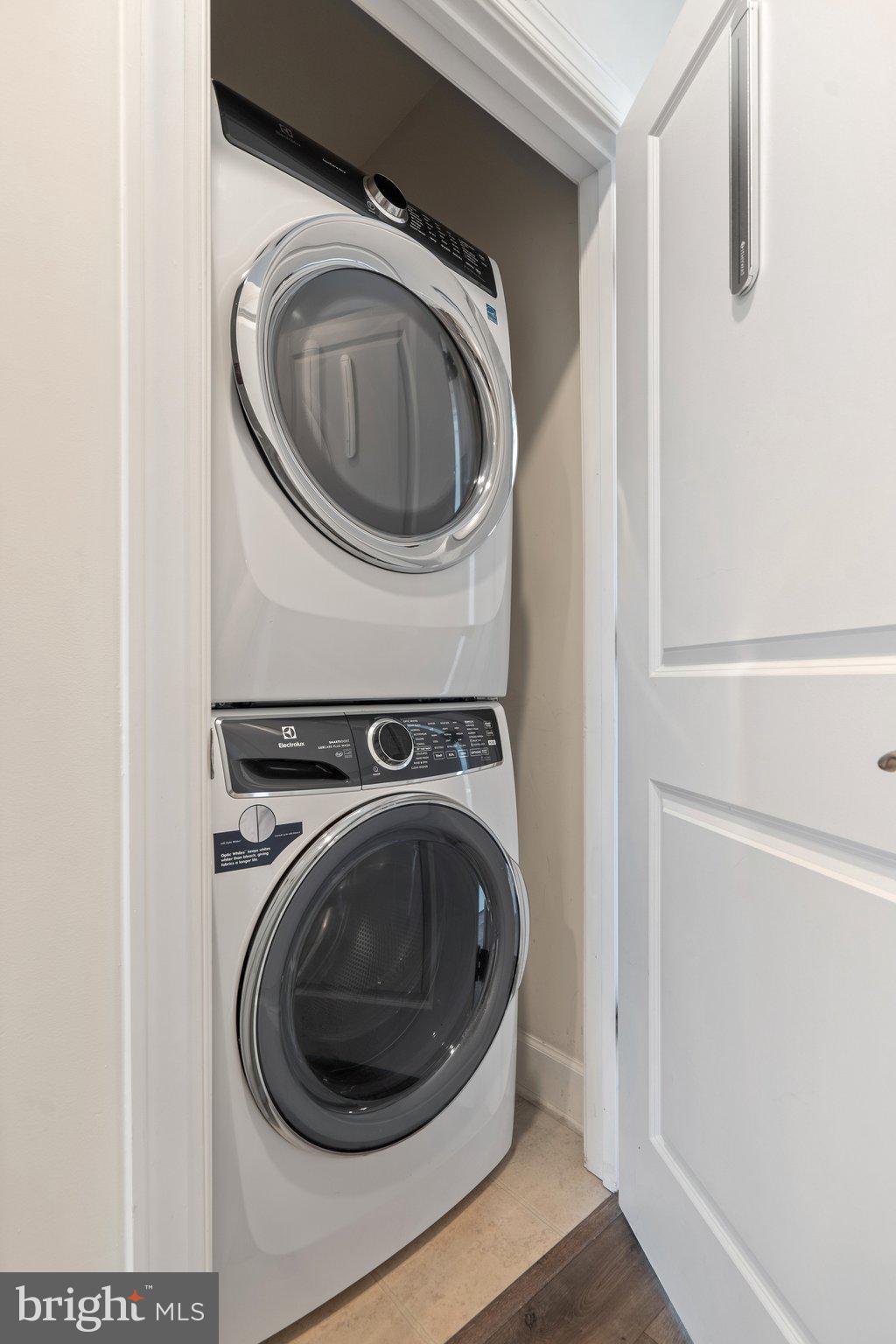 45397 Daveno Square Sterling, VA 20164 - Photo 24 of 44 a utility room with dryer and washer