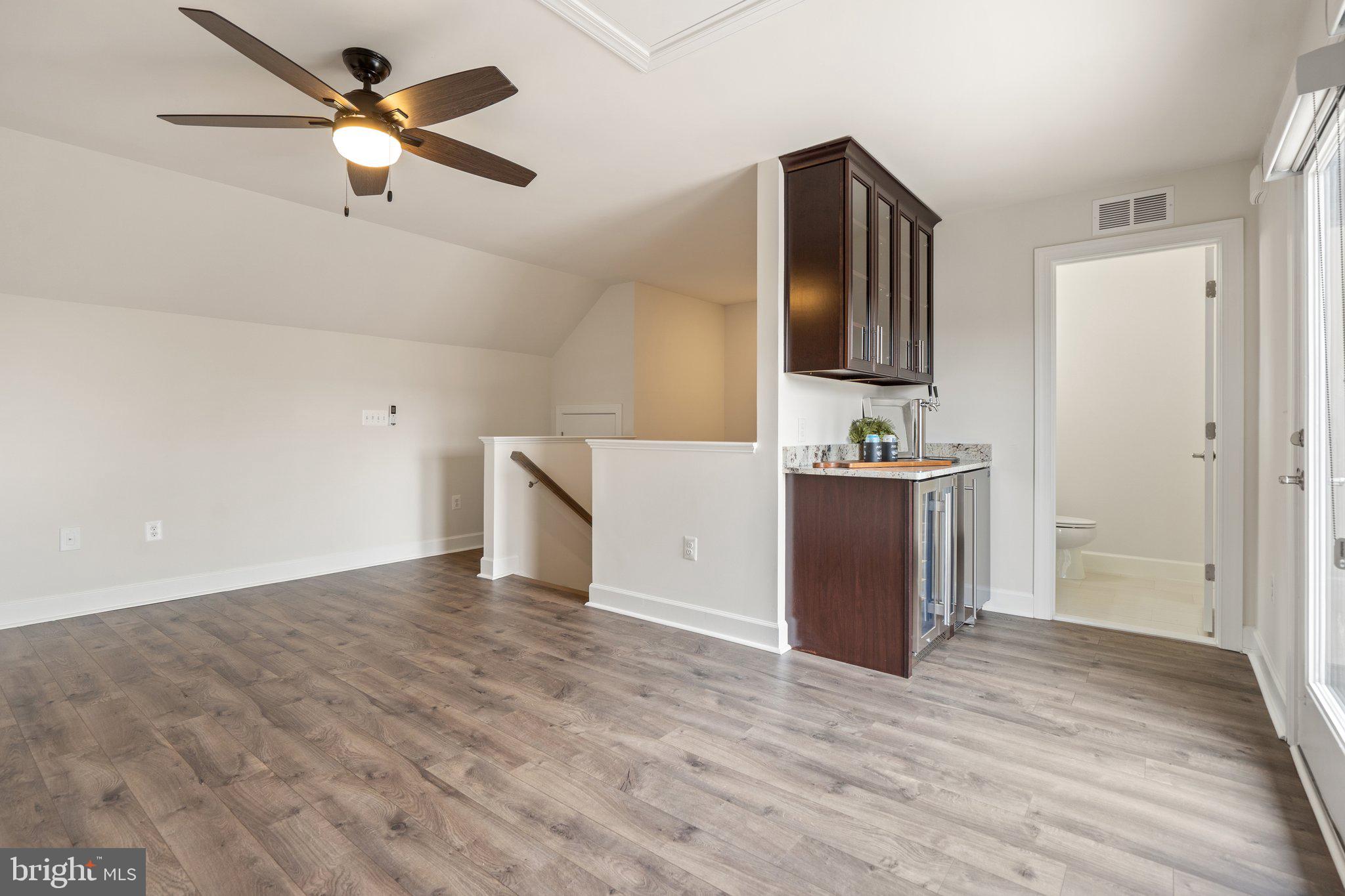 45397 Daveno Square Sterling, VA 20164 - Photo 27 of 44 a view of a kitchen with a sink and a refrigerator