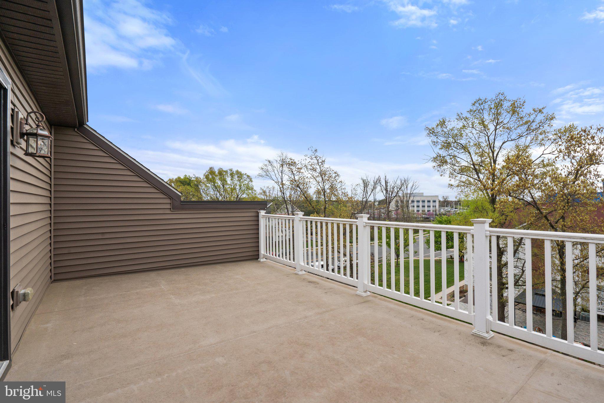 45397 Daveno Square Sterling, VA 20164 - Photo 30 of 44 a view of a chair in the balcony