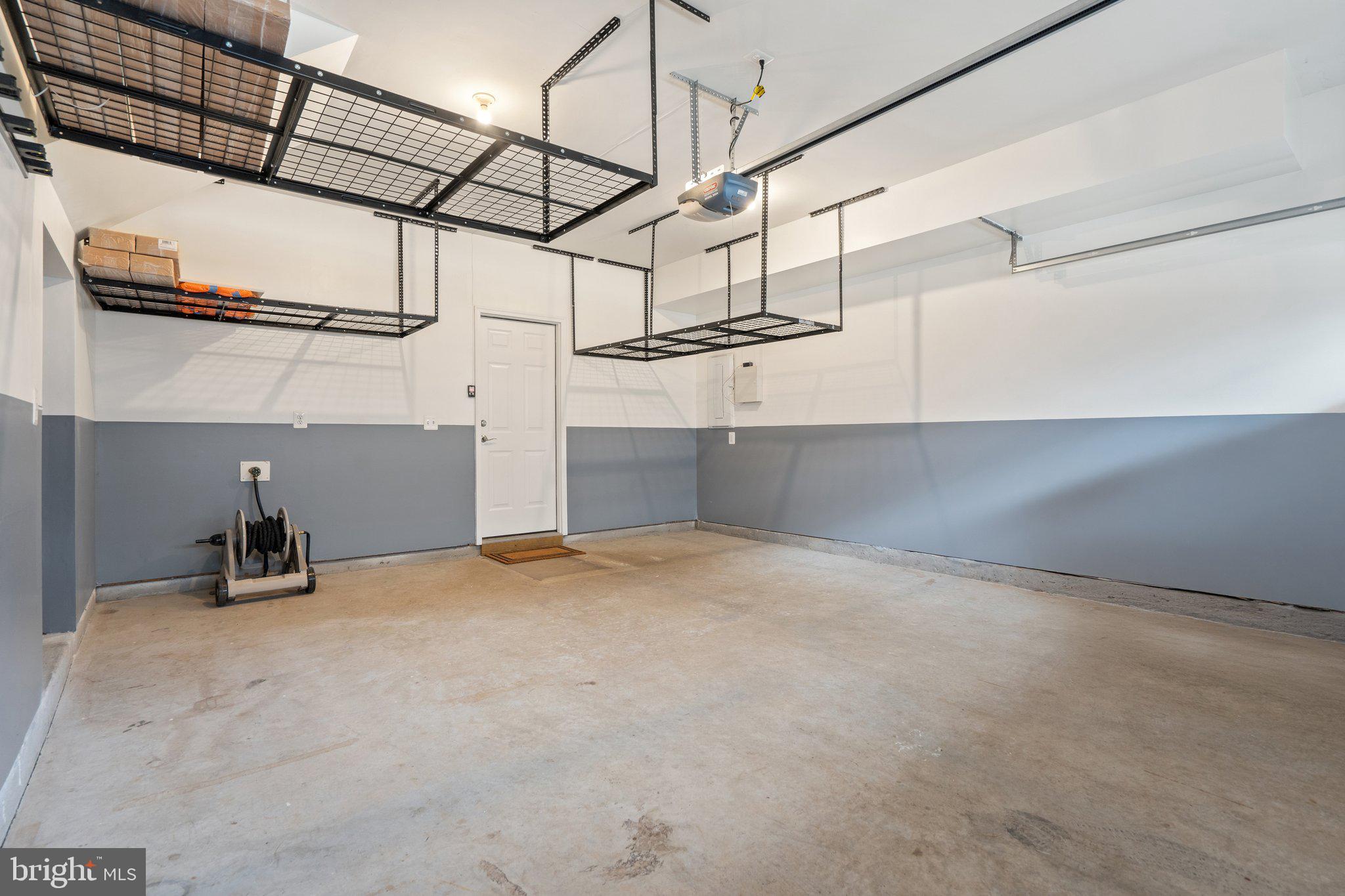 45397 Daveno Square Sterling, VA 20164 - Photo 38 of 44 a view of a room with racks on the wall