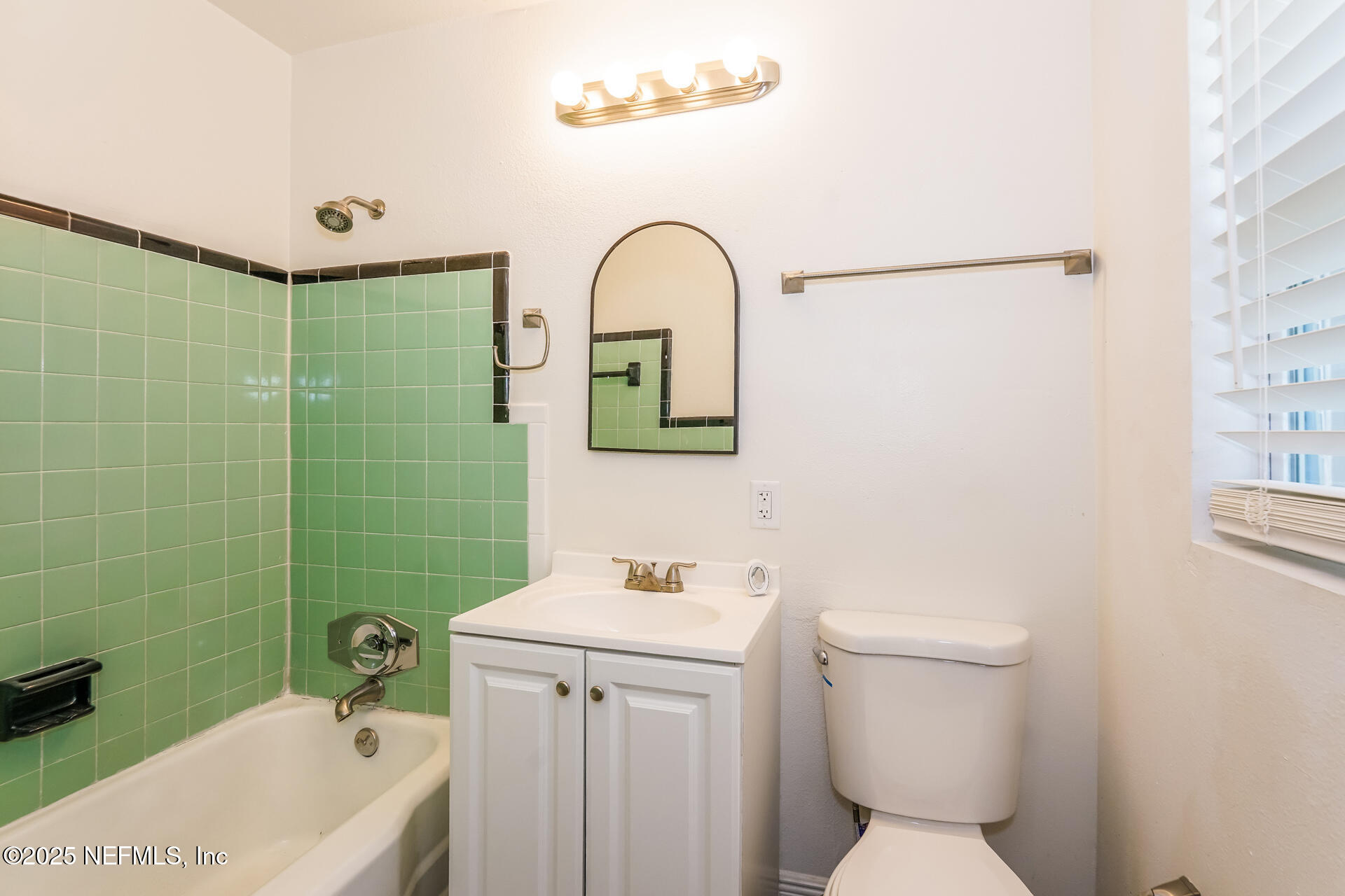 128 Aurora Street Cocoa, FL 32922 - Photo 12 of 21 012-photo-main-bathroom-14455059
