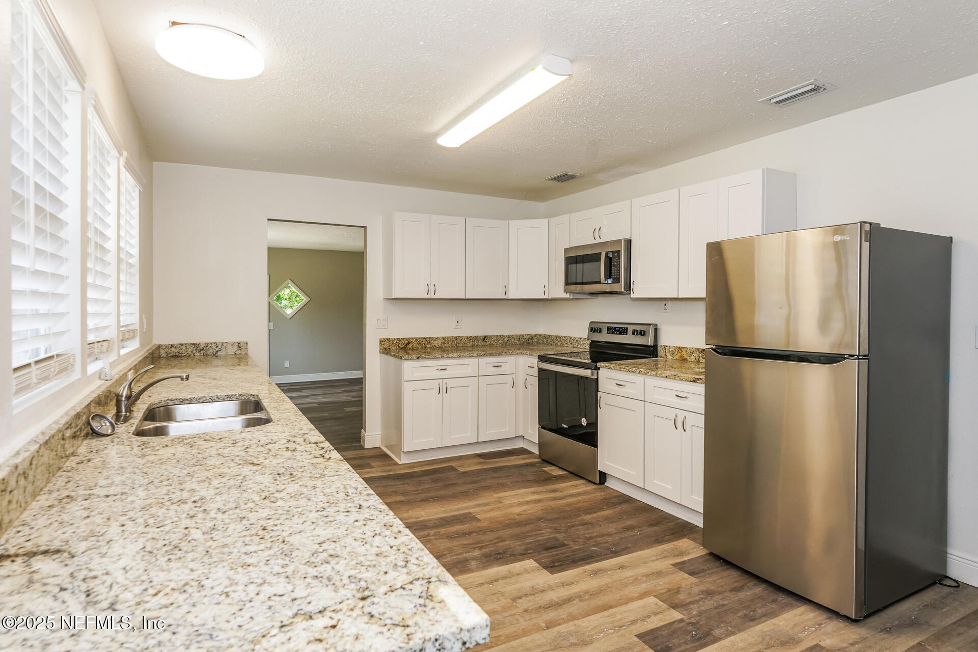 128 Aurora Street Cocoa, FL 32922 - Photo 5 of 21 005-photo-kitchen-14453953