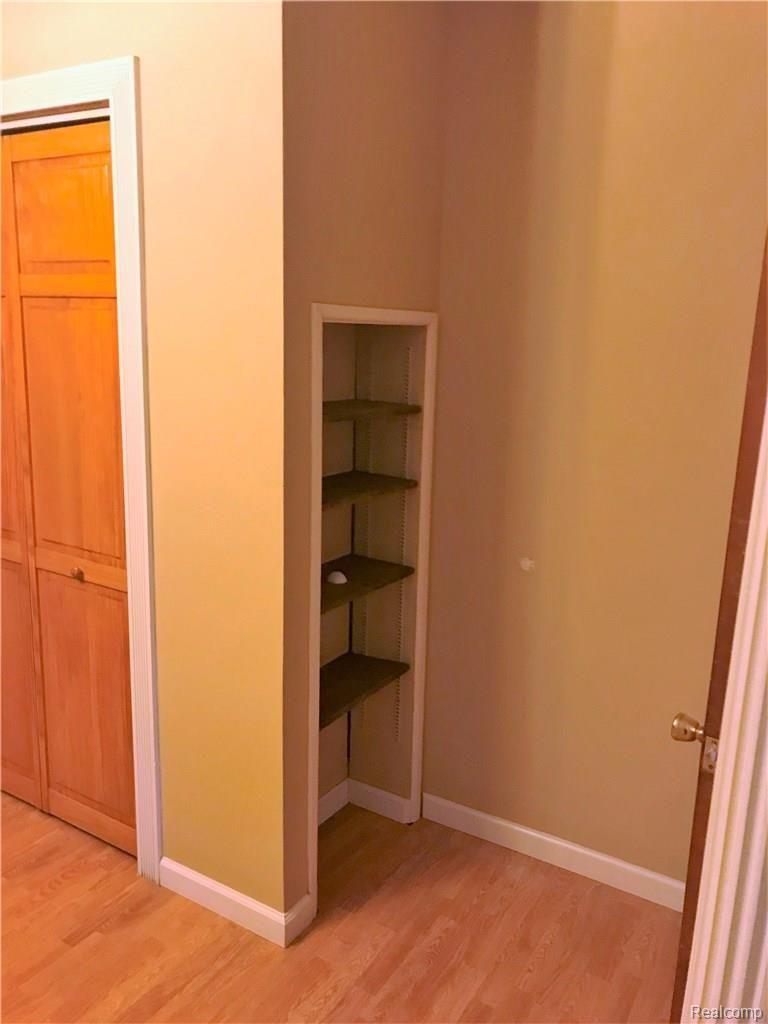 8890 Rickett Road Brighton, MI 48116 - Photo 14 of 26 Master Bedroom Built In.JPG