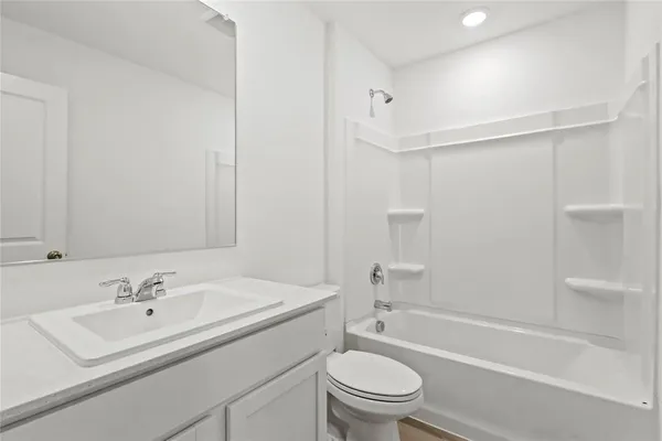 a bathroom with a sink toilet and a bathtub