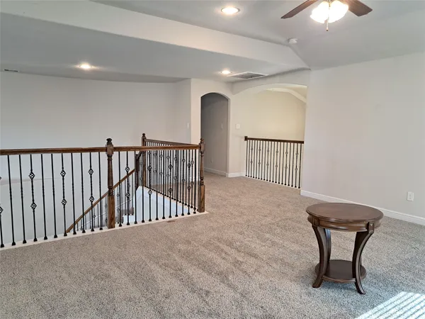 a view of staircase with furniture