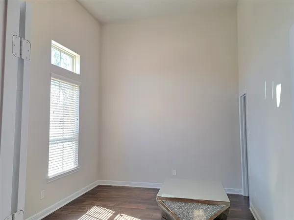 a view of an empty room and window