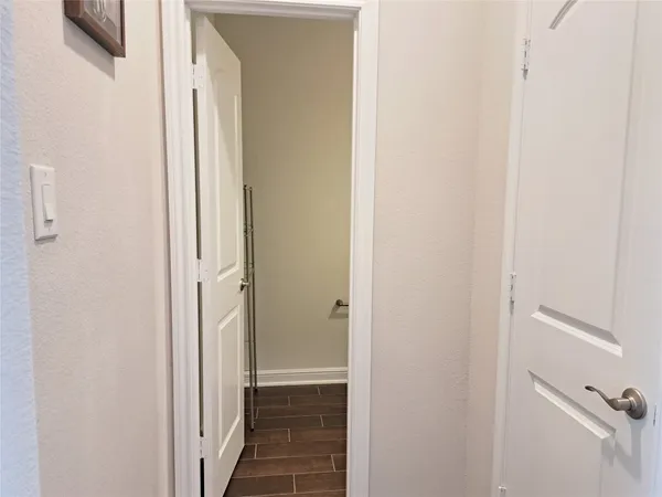 a view of a bathroom from the hallway