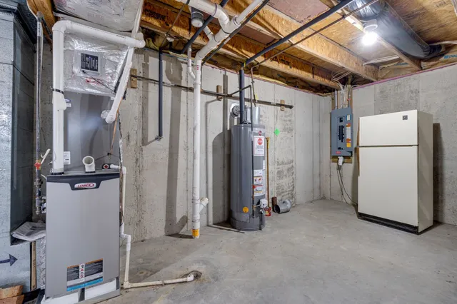 a view of multiple houses with a yard