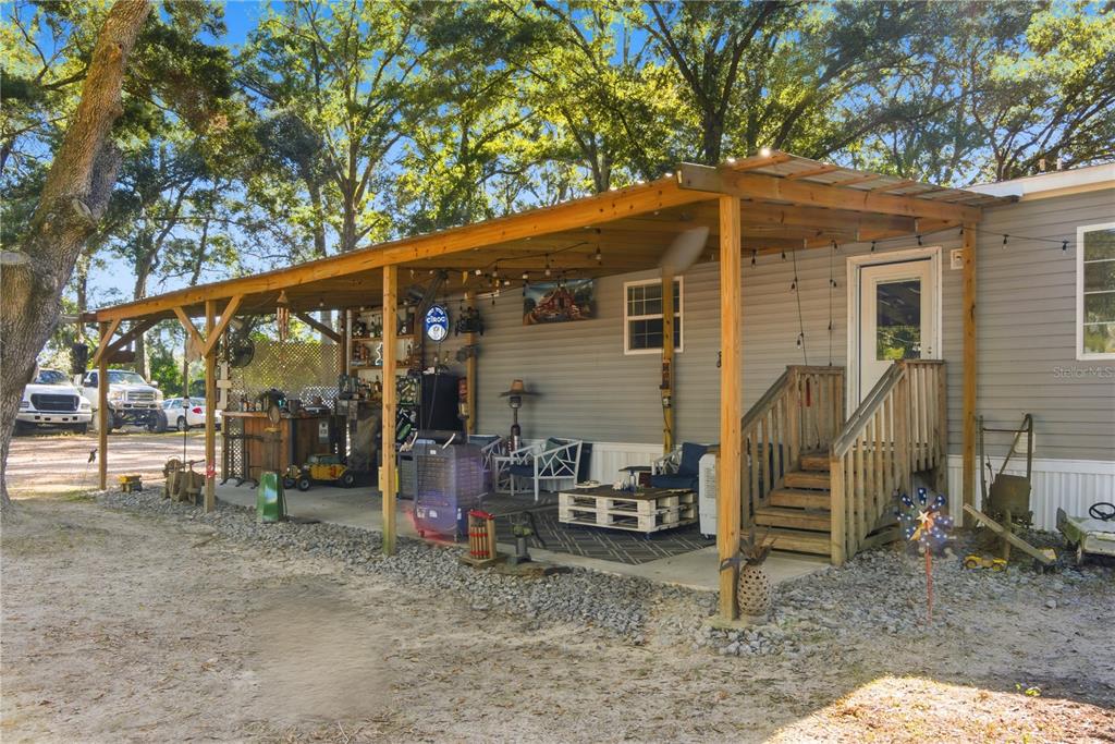 4506 Northwest 10th Street Bell, FL 32619 - Photo 21 of 50 a view of a house with a backyard