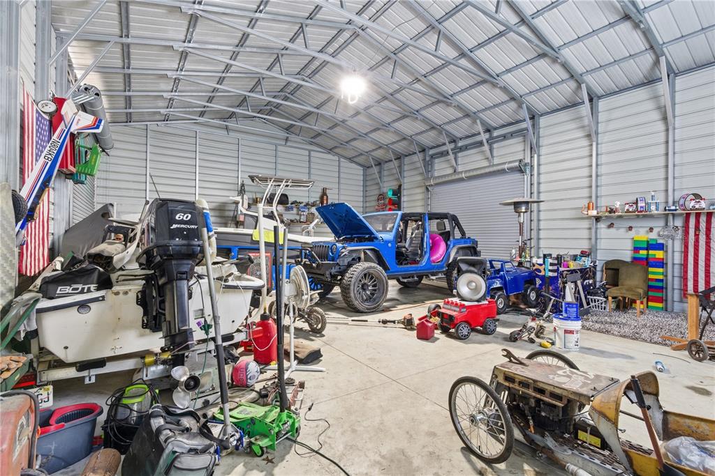 4506 Northwest 10th Street Bell, FL 32619 - Photo 25 of 50 a view of a storage room with a lot of stuff