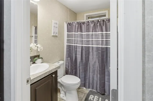 a kitchen with a dining table and chairs