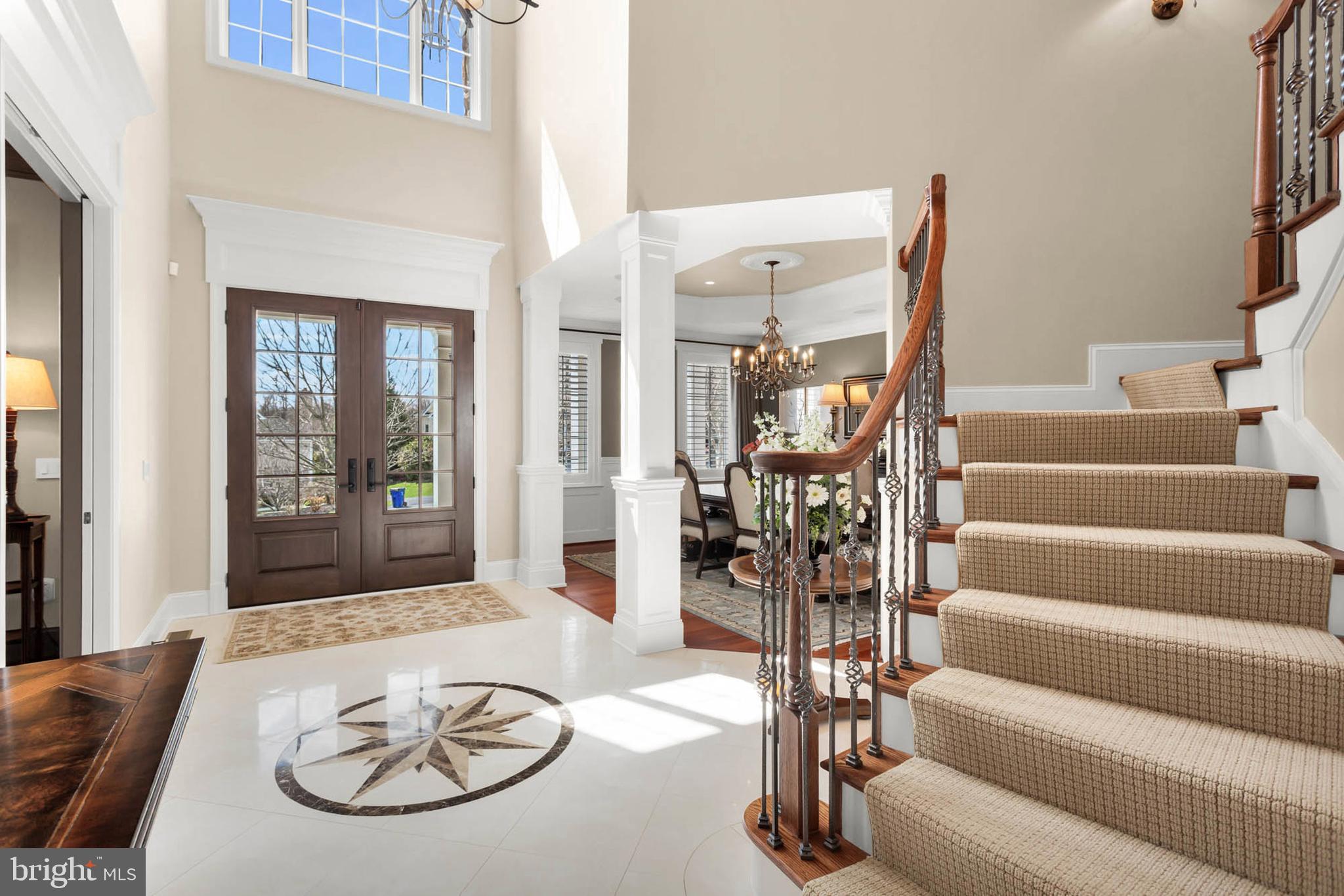 13615 Fox Stream Way West Friendship, MD 21794 - Photo 3 of 87 Custom flooring with emblem