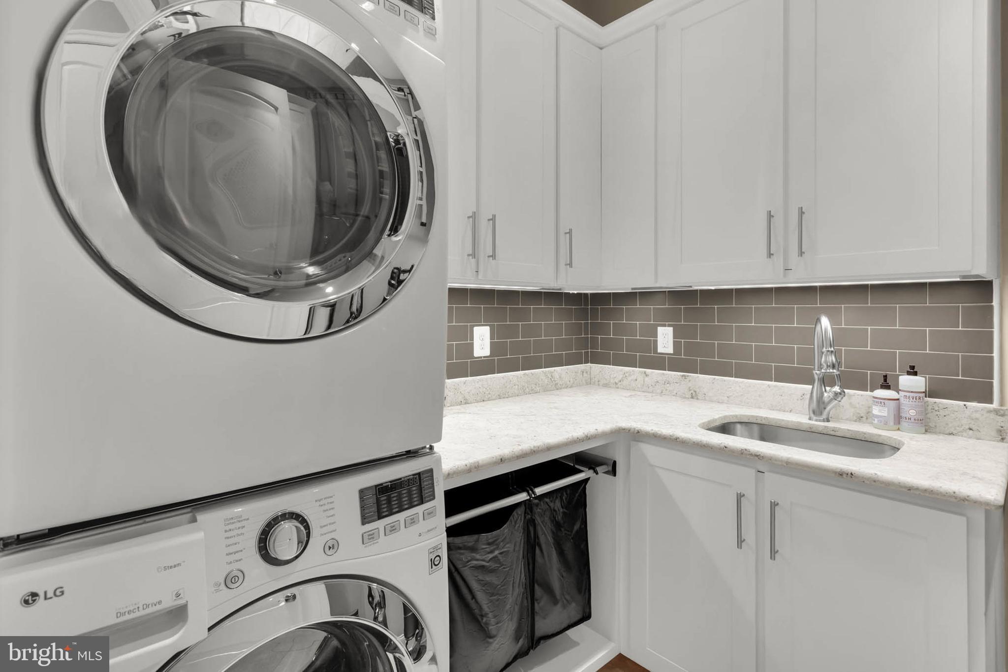 13615 Fox Stream Way West Friendship, MD 21794 - Photo 31 of 87 Main level laundry with leathered countertops