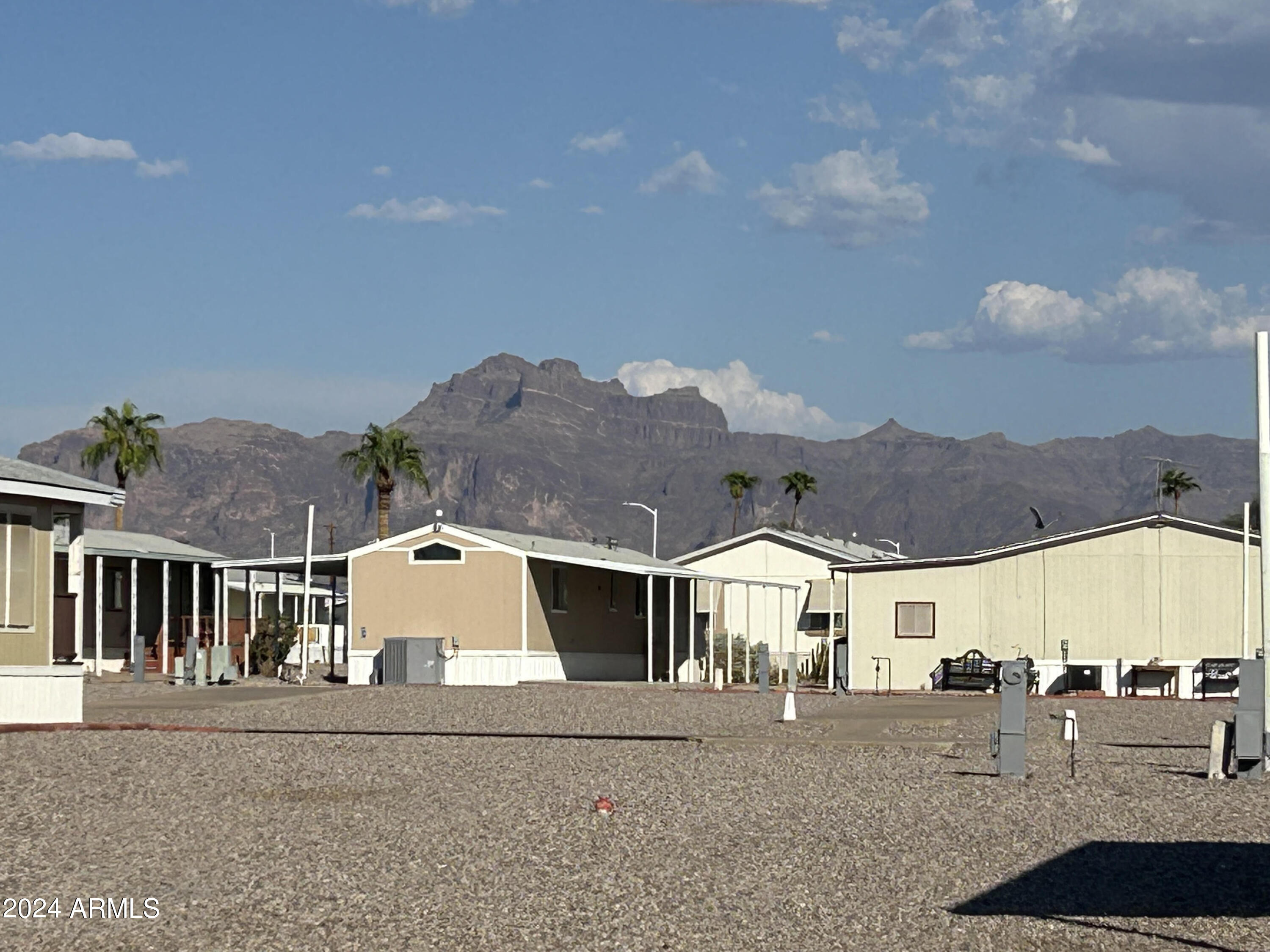 301 South Signal Butte Road, Unit 938 Apache Junction, AZ 85120 - Photo 2 of 11 an aerial view of multiple house