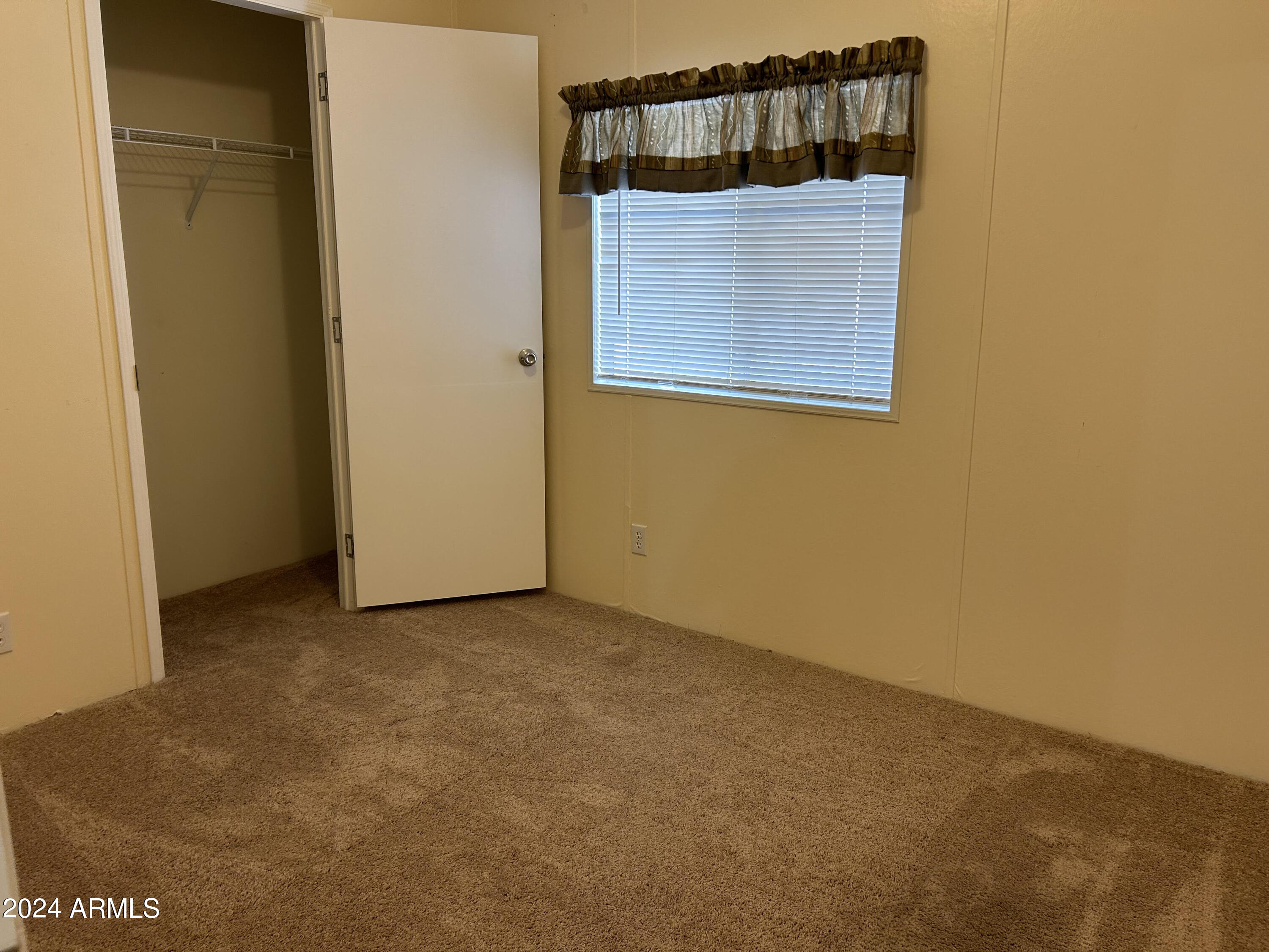 301 South Signal Butte Road, Unit 938 Apache Junction, AZ 85120 - Photo 9 of 11 a view of staircase with door