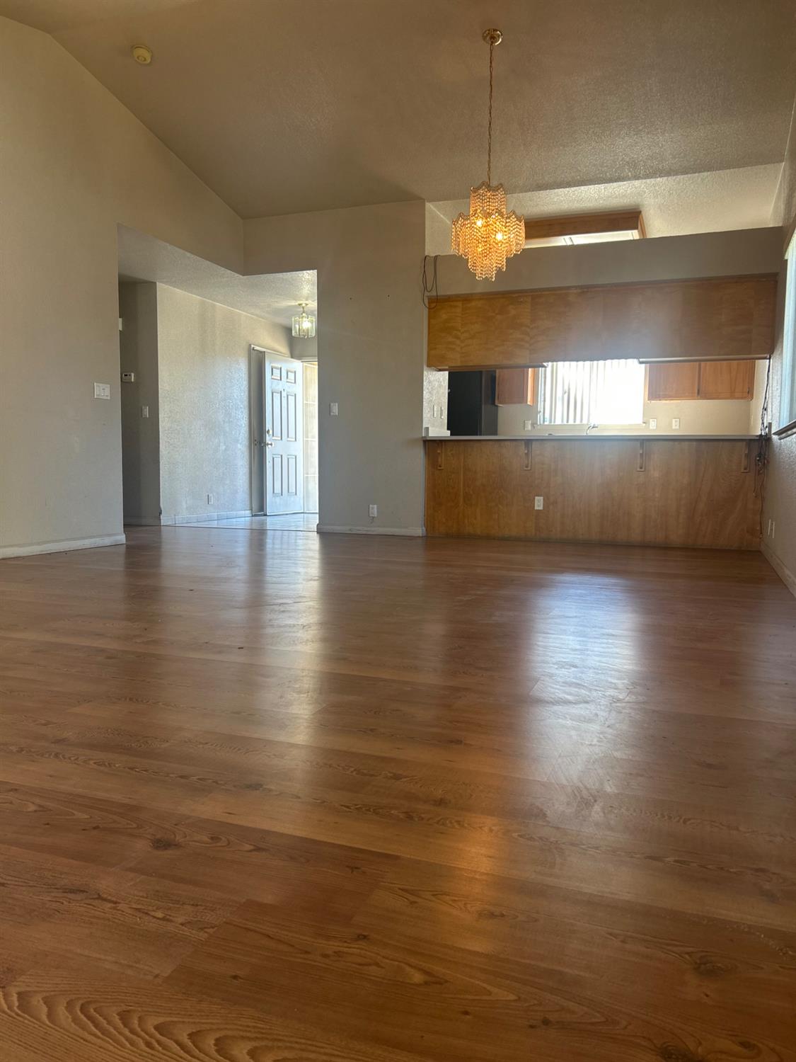 3421 Penny Lane Modesto, CA 95354 - Photo 5 of 12 a view of a room with window and wooden floor