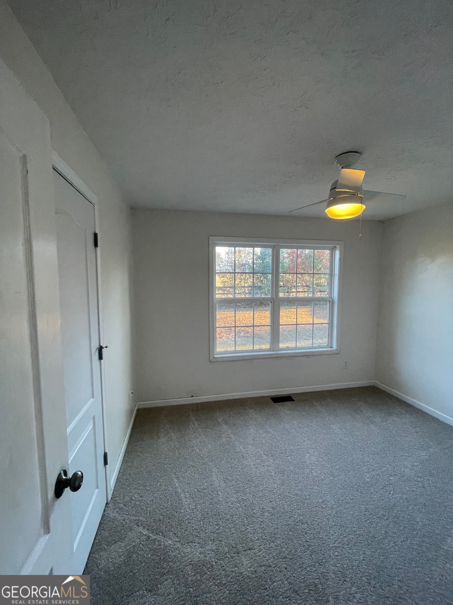 721 Meadow Spring Drive Temple, GA 30179 - Photo 25 of 43 a view of an empty room with a window
