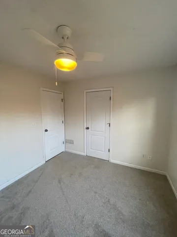 an empty room with a bench