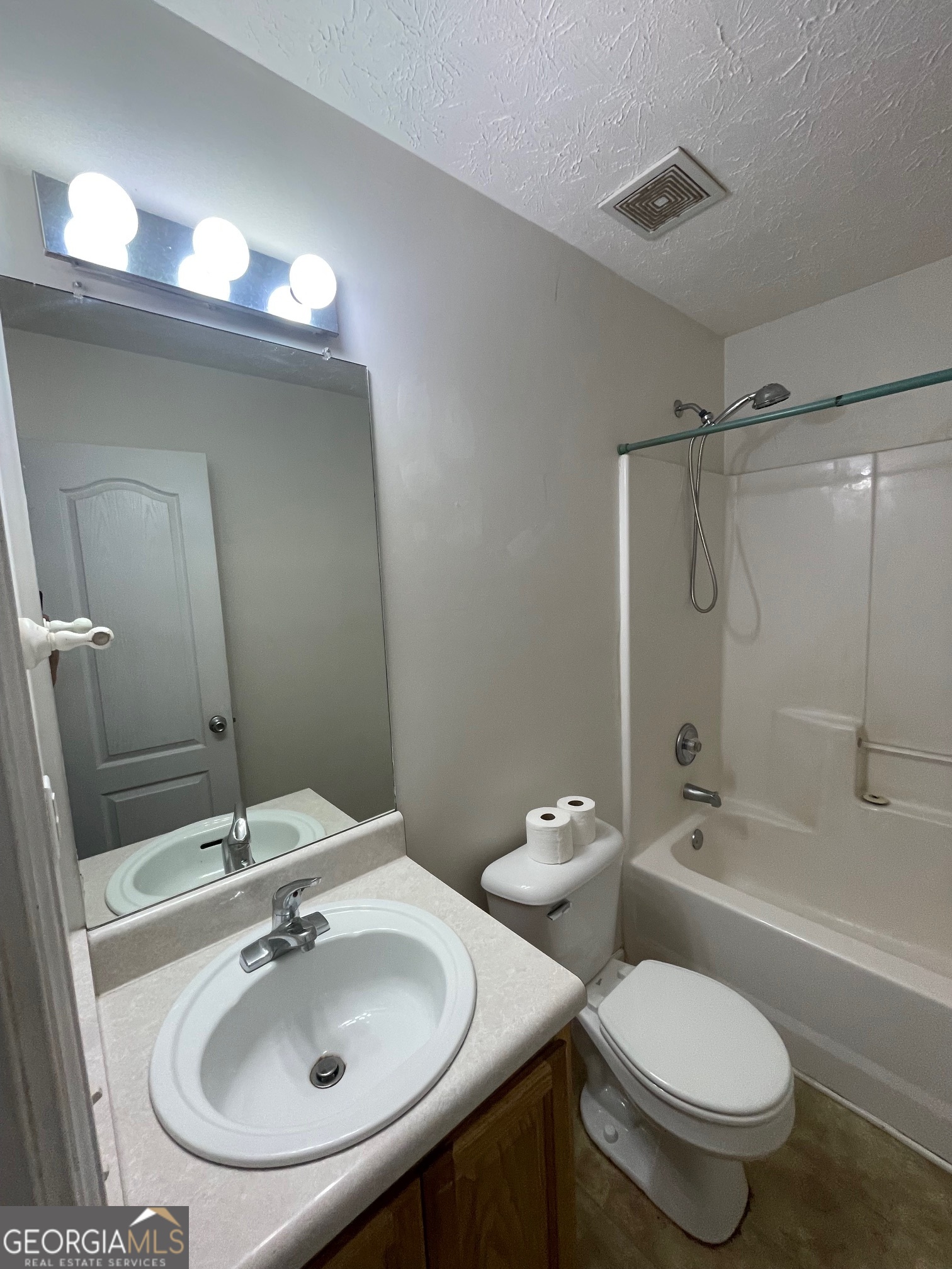 721 Meadow Spring Drive Temple, GA 30179 - Photo 31 of 43 a bathroom with a sink toilet and shower